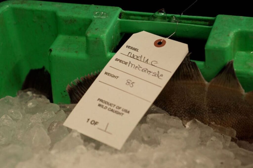 Domestic seafood label showing wild-caught seafood sourced and processed in the USA for consumer transparency