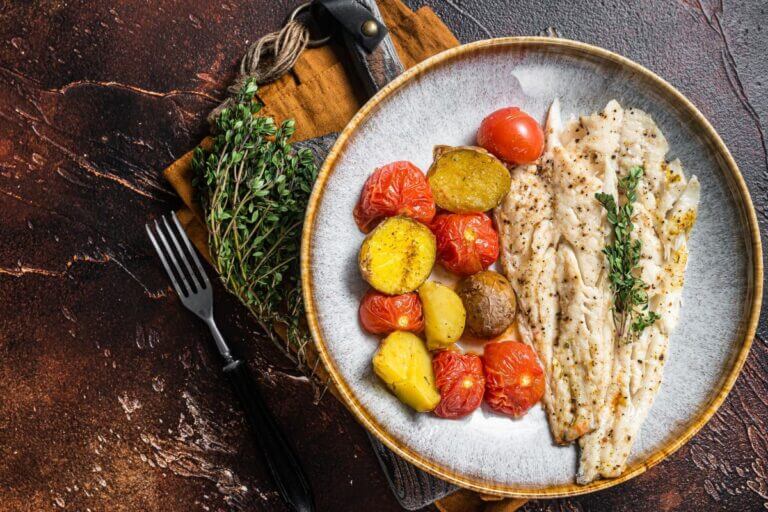 Plated wild-caught whitefish dish with vegetables